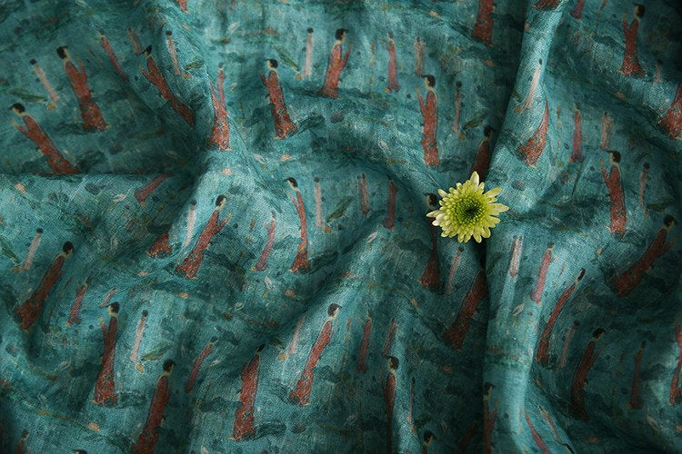 Tissu ramie imprimé Bouddha turquoise : 145 cm de large. Idéal pour l’ameublement, les costumes et la couture.