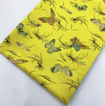 Tissu jacquard papillon : 145 cm de large, en polyester