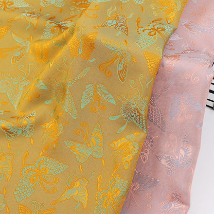 Tissu satiné jacquard papillon : impression numérique bicolore, 150 cm de large