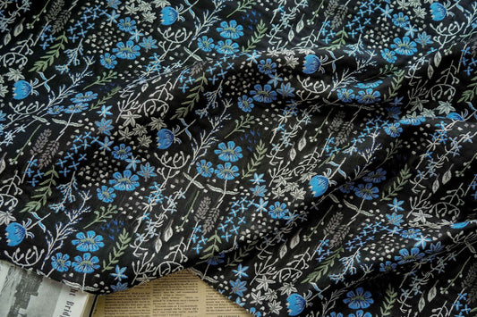 Tissu jacquard à fleurs bleues : polyester en relief 3D, largeur 145 cm