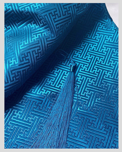 Tissu brocart chinois turquoise : motif frise, 150 cm de large, pour costumes et décoration
