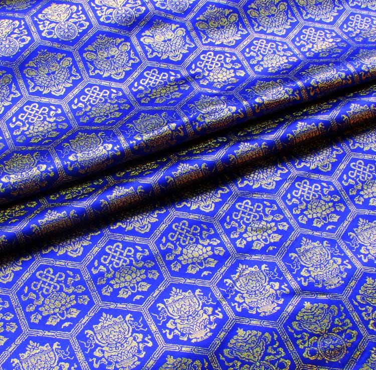 Tissu tissé or tibétain : jacquard rayonne porte-bonheur, 147 cm de large