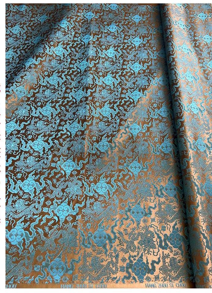 Tissu brocart bleu sarcelle à motif de dragon chinois : mélange de soie et de rayonne, 75 cm de large