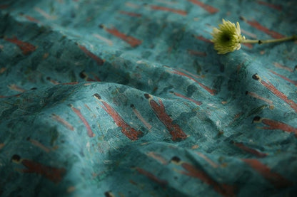 Tissu ramie imprimé Bouddha turquoise : 145 cm de large. Idéal pour l’ameublement, les costumes et la couture.