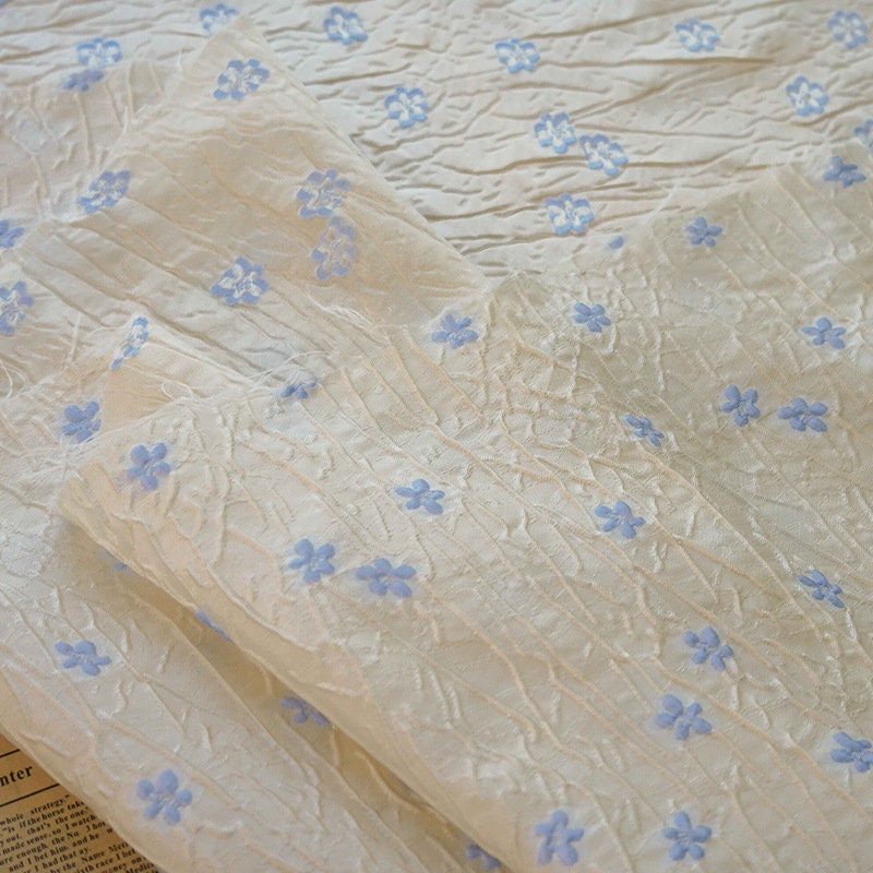 Embossed Beige Polyester Fabric, Blue Flowers, Upholstery & Costume, 56"W