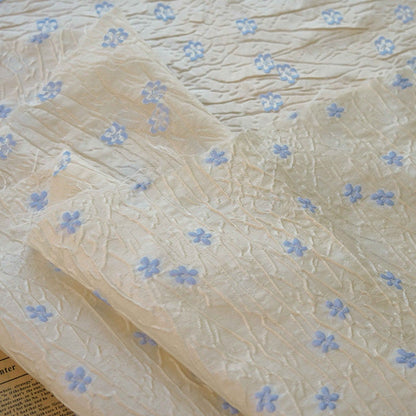 Embossed Beige Polyester Fabric, Blue Flowers, Upholstery & Costume, 56"W