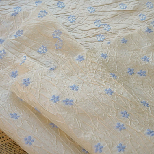 Tissu polyester beige gaufré, fleurs bleues, ameublement et costumes, 142 cm de large