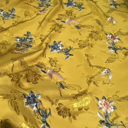 Tissu brodé à motifs floraux : mélange coton-rayonne de 150 cm de large