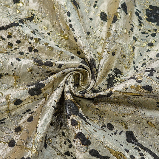 Tissu jacquard doré et bronzé : Matière de créateur métallisée en relief