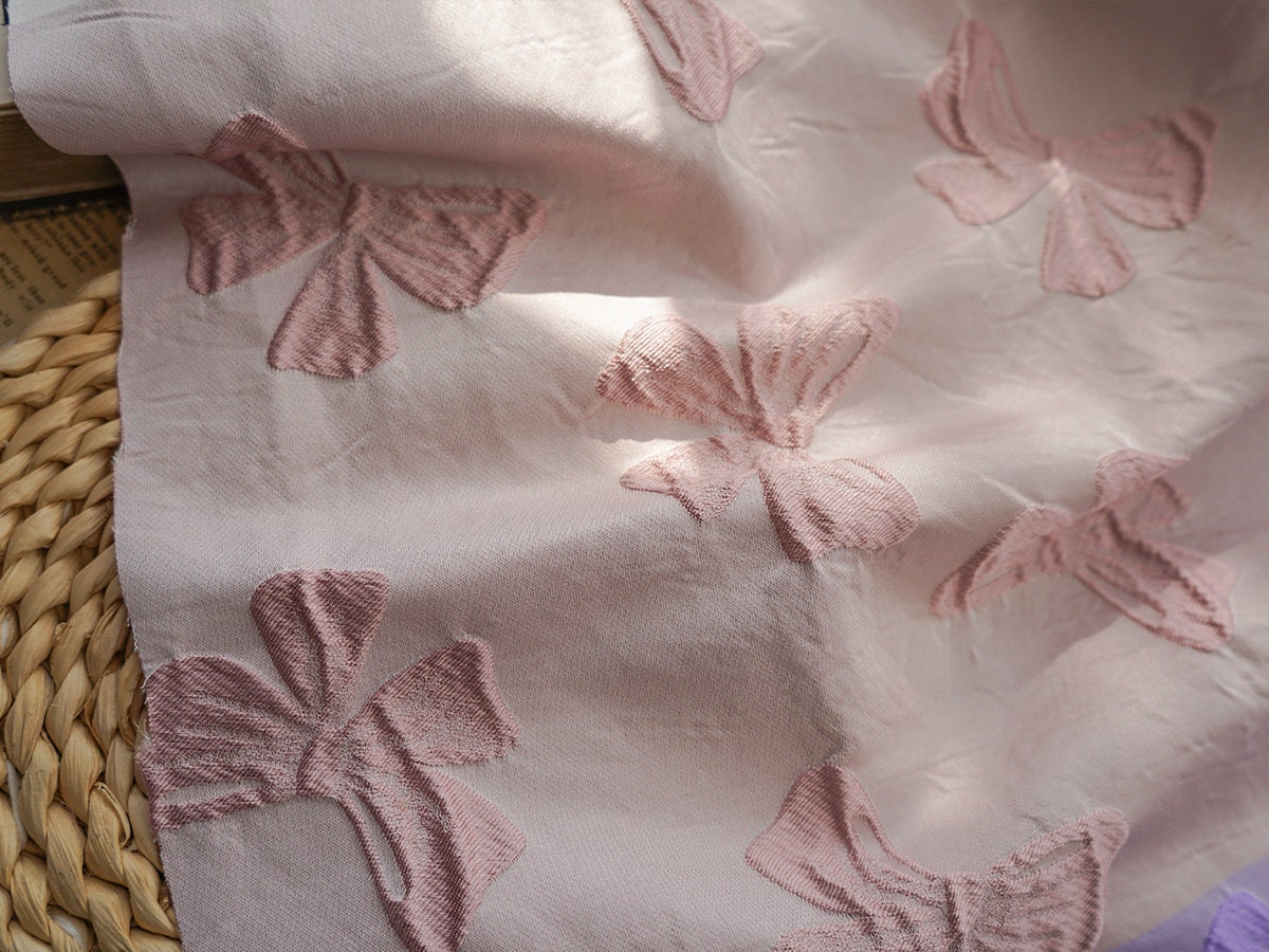 Black Bow Jacquard Fabric: Yarn-Dyed Embossed Upholstery Material, 57" Wide