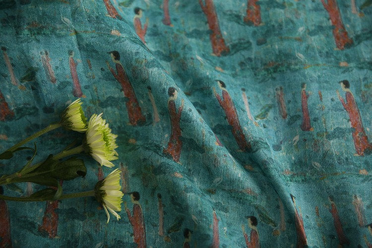Tissu ramie imprimé Bouddha turquoise : 145 cm de large. Idéal pour l’ameublement, les costumes et la couture.