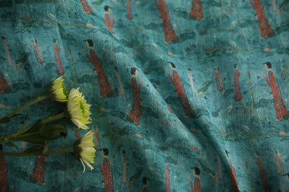 Tissu ramie imprimé Bouddha turquoise : 145 cm de large. Idéal pour l’ameublement, les costumes et la couture.