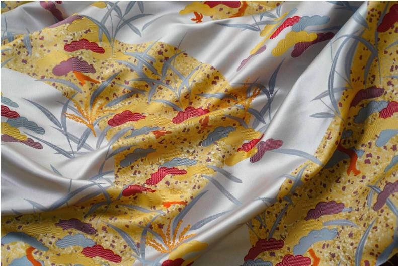 Tissu jacquard Jardin de Printemps : 165 cm de large, coton et polyester