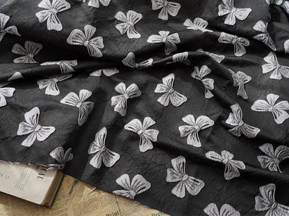 Black Bow Jacquard Fabric: Yarn-Dyed Embossed Upholstery Material, 57" Wide