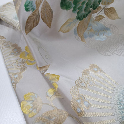 Tissu jacquard floral vintage : motif papillon et fleurs, 145 cm de large