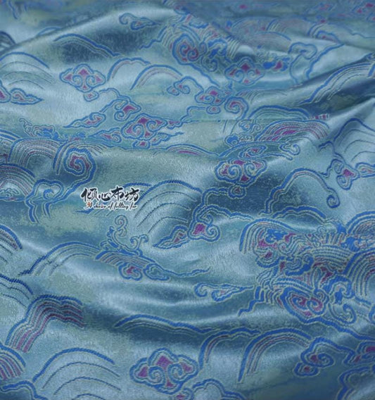 Tissu brocart bleu turquoise : Mer de nuages ​​et de vagues, 75 cm de large