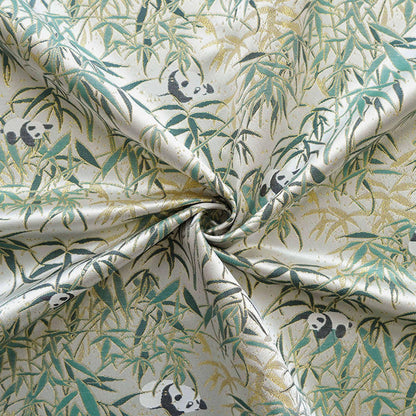 Tissu jacquard double face à motif de feuilles de bambou panda avec fils dorés, largeur 60 pouces