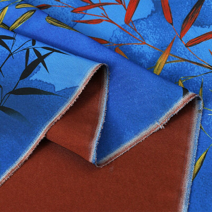 Tissu imprimé floral bambou : mélange de polyester et d’élasthanne bleu, 150 cm de large