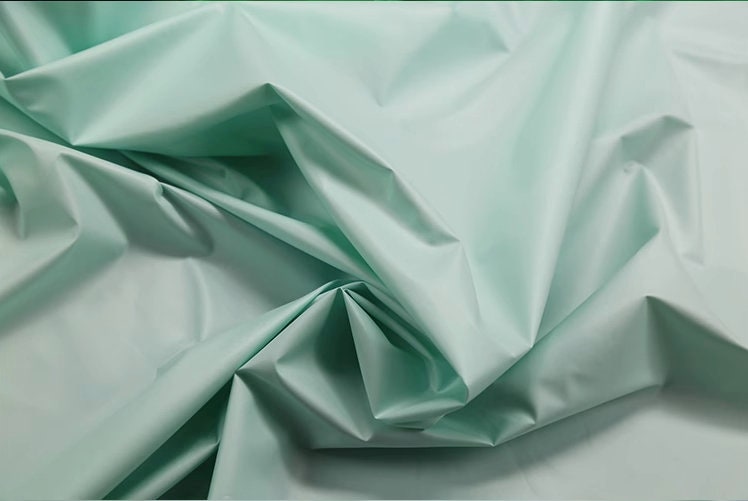 Midnight Green Luminous Fabric: Waterproof Retro-Reflective Polyester (59"W)