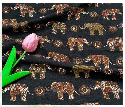 Tissu en coton à imprimé éléphants : motif ethnique superposé, matelassage et couture