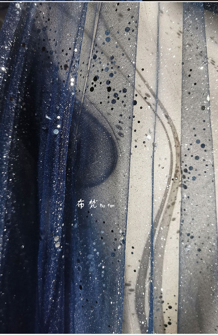 Tissu organza Space Galaxy : paillettes bronzées, 150 cm de large