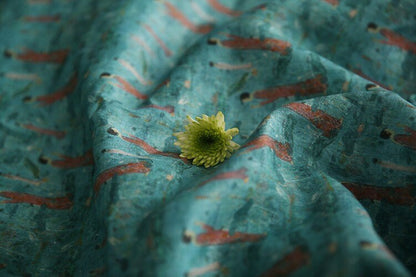 Tissu ramie imprimé Bouddha turquoise : 145 cm de large. Idéal pour l’ameublement, les costumes et la couture.