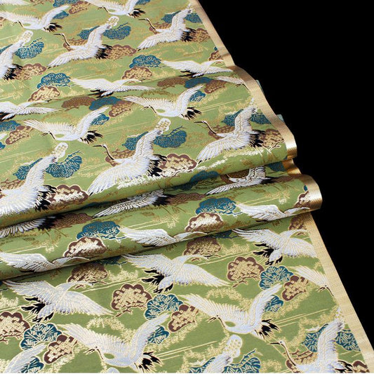 Tissu satin jacquard Crane : motif oiseaux en fil d'or (58" de large)