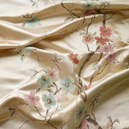 Tissu brocart Fleur de Prunier : Jacquard de rayonne champagne, 150 cm de large