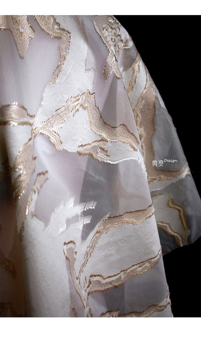 Tissu organza jacquard 3D doré : tissu transparent gaufré, 145 cm de large
