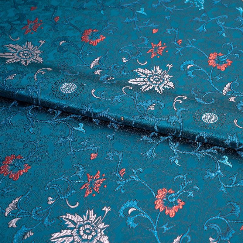 Tissu brocart floral bleu paon : mélange de rayonne, 75 cm de large