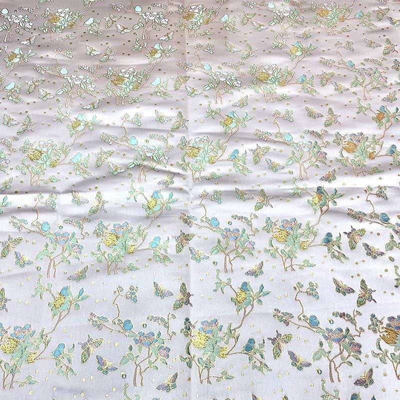 Tissu brocart papillon : Jacquard prune argenté, 150 cm de large