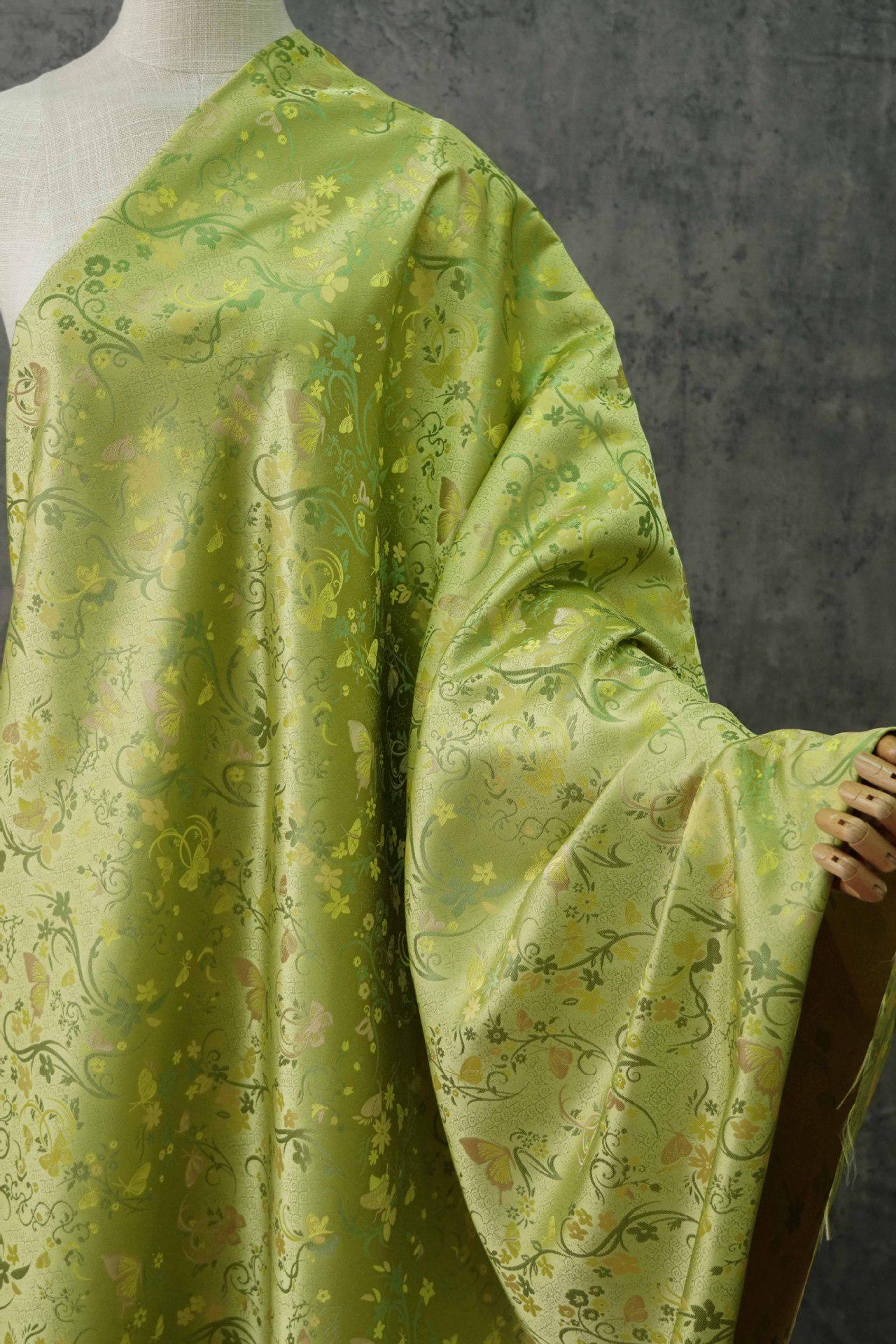 Tissu brocart papillon vert printemps : jacquard polyester de 165 cm de large