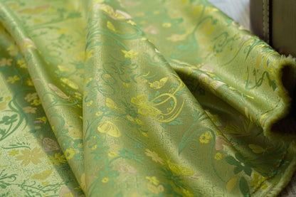 Tissu brocart papillon vert printemps : jacquard polyester de 165 cm de large