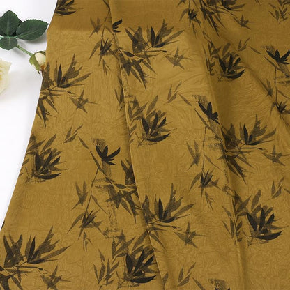 Tissu jacquard à motif de feuilles de bambou dorées : Jupes et gilets ethniques Dai (59"L)