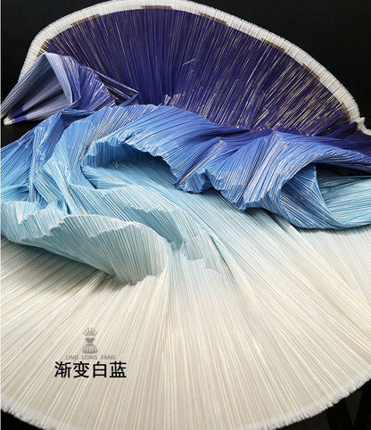 Crêpe plissé dégradé : 150 cm de large, polyester rigide, idéal pour la décoration et les costumes à faire soi-même.