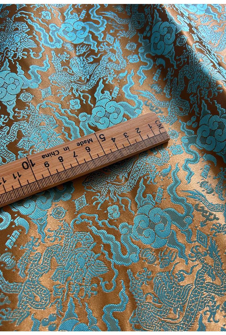 Tissu brocart bleu sarcelle à motif de dragon chinois : mélange de soie et de rayonne, 75 cm de large