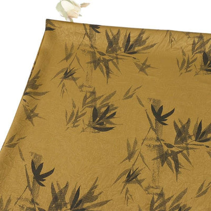 Tissu jacquard à motif de feuilles de bambou dorées : Jupes et gilets ethniques Dai (59"L)