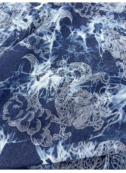 Tissu denim en coton délavé tie-dye : matière jean bleu délavé (170 cm de large)