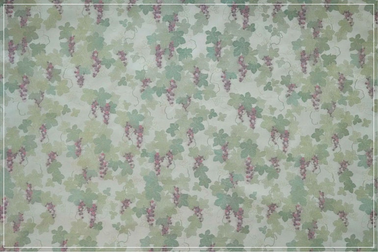 Tissu jacquard raisin : polyester gaufré doré et bronzé