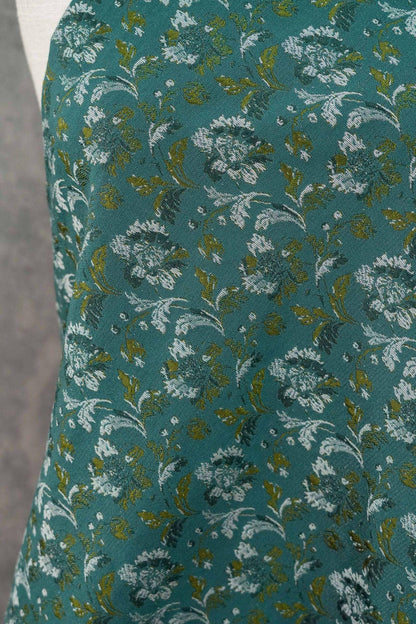 Tissu jacquard floral turquoise : matériau tissé couleur pour la couture et l'ameublement