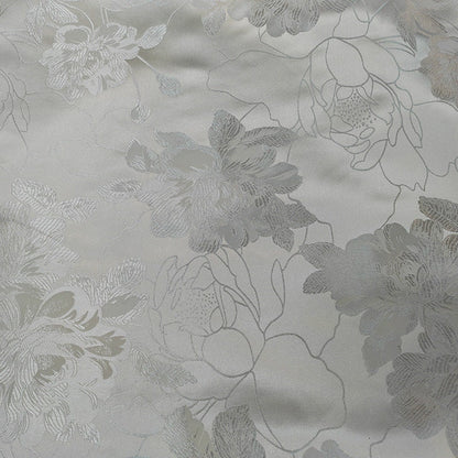 Tissu brocart floral métallisé blanc : rayonne de 114 cm de large, vendu au mètre