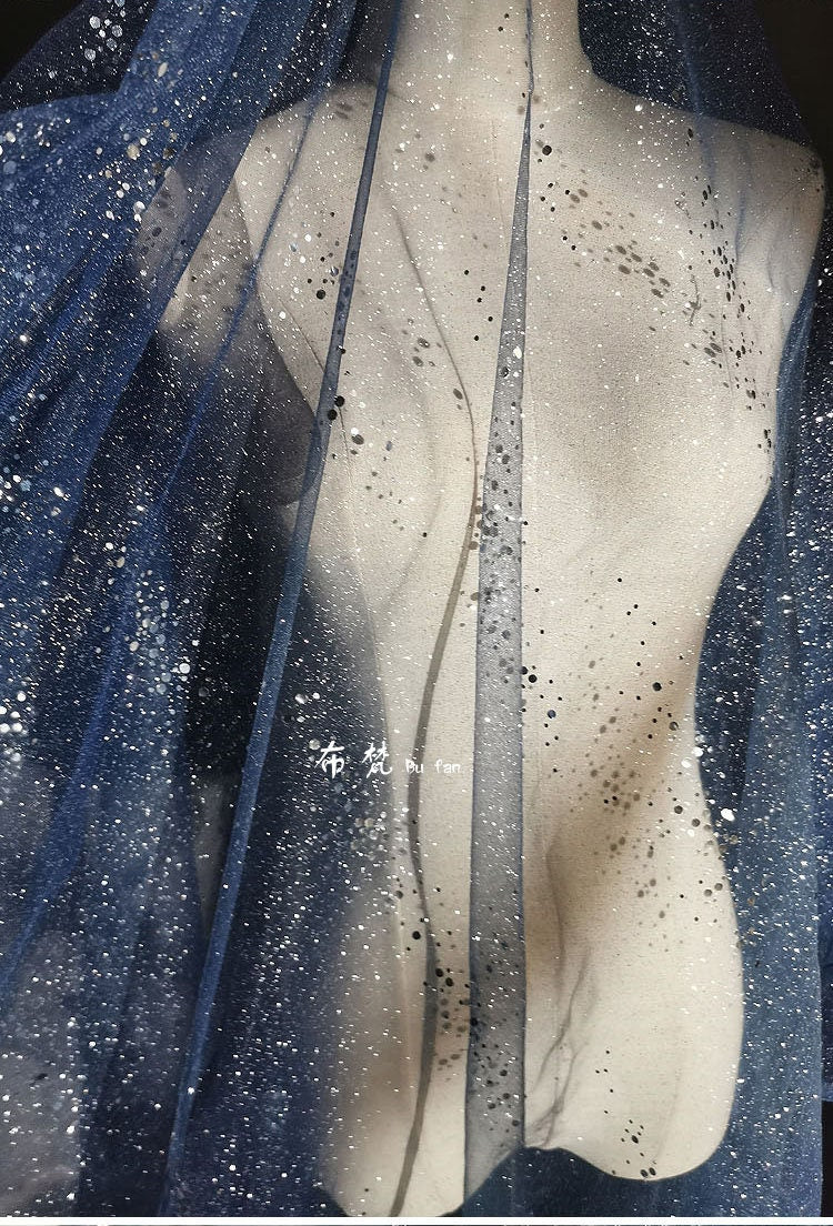 Tissu organza Space Galaxy : paillettes bronzées, 150 cm de large