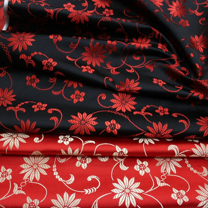 Tissu satiné brocart à motifs floraux : rouge et noir, 75 cm de large