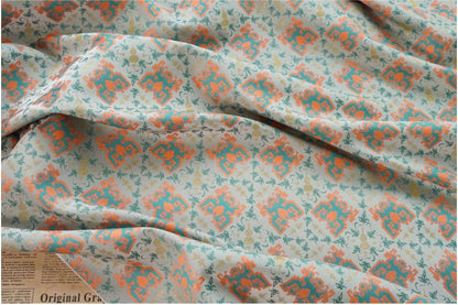 Tissu jacquard doré : motif totem asiatique ancien, 150 cm de large