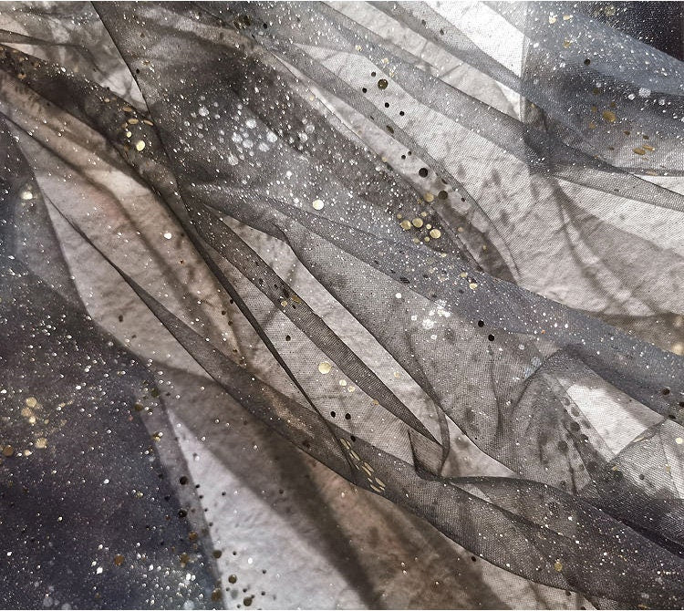 Tissu organza Space Galaxy : paillettes bronzées, 150 cm de large
