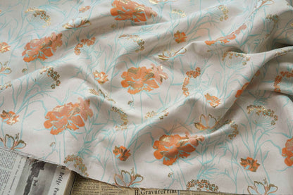 Tissu jacquard floral à fil doré : texture 3D, largeur 140 cm