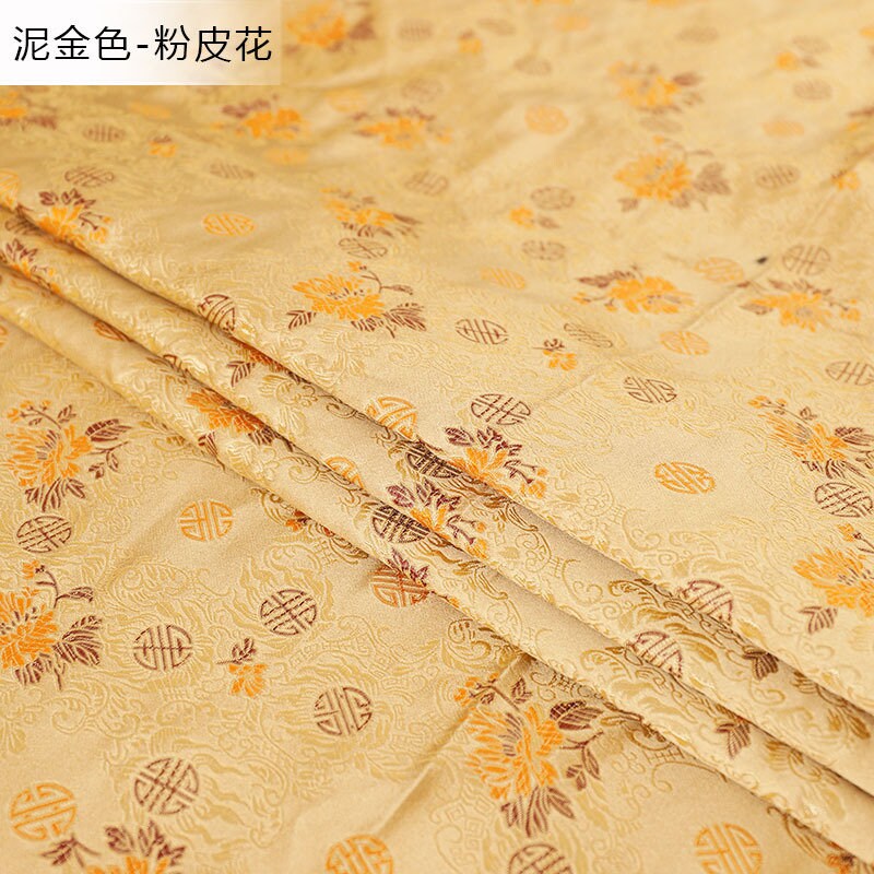 Tissu brocart or pâle : rayonne de 150 cm de large pour la couture et l’ameublement, motifs traditionnels