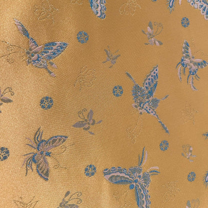 Tissu brocart papillon orange : jacquard imitation soie, 150 cm de large